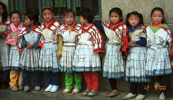 Young Big Flower Miao girls in their festival finery - Xian Ma village, Hou Chang township, Puding county, Guizhou province 0010x11.jpg