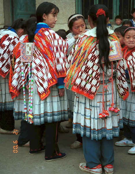 Big Flower Miao girl in her festival finery - Xian Ma village, Hou Chang township, Puding county, Guizhou province 0010x16.jpg