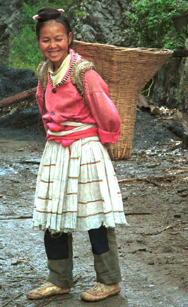 Big Flower Miao woman with back basket - Xian Ma village, Hou Chang township, Puding county, Guizhou province 0010x26.jpg