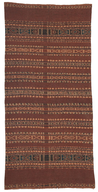 Wate-mea (Red sarong), from Ili Api, woven by Juliana Boy. The ikat was dyed by another lady in the village.