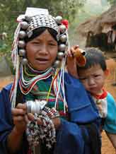 to Jpeg 56K Loimi-Akha woman and her son in a village near Chiang Rai 3246