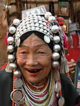 to Jpeg 54K Old Loimi-Akha woman in a village near Chiang Rai with her teeth stained by chewing betel nut. 3248