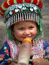 to Jpeg 56K Young White Hmong girl in her festival finery  3311