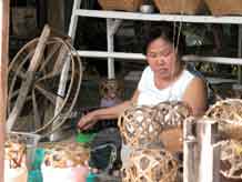 to Jpeg 56K Winding thread onto spools at Baan Rai Pai Ngarm textile museum  3363