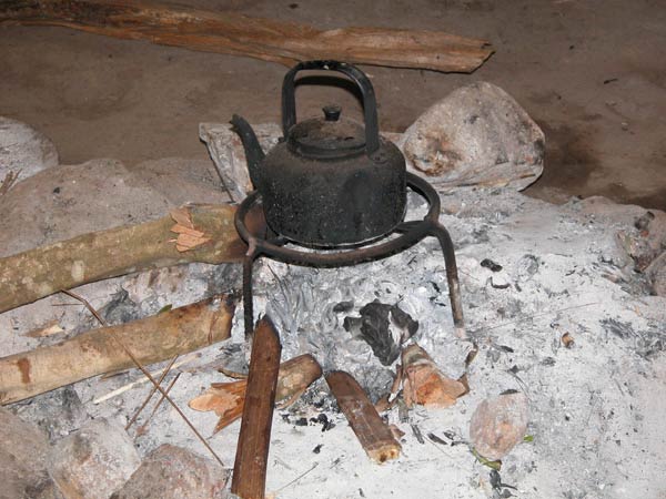 Jpeg 54K Kettle on the hearth in a White Hmong house in the village of Ban Pha-nok-kok  3438