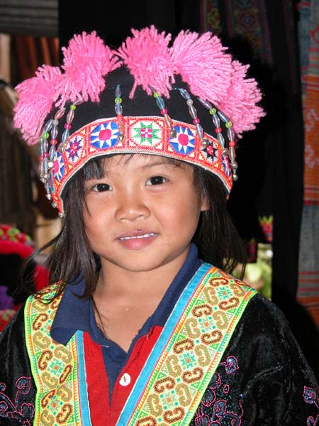 Jpeg 57K Young White Hmong girl in Ban Pha-nok-kok village dressed in her festival finery  3444