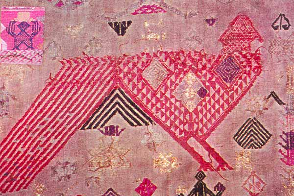 ss01 Jpeg 56K Section of a very old Tai Daeng “curtain” used for wedding and complete with red cotton ruffle.  The gold thread is unusual.