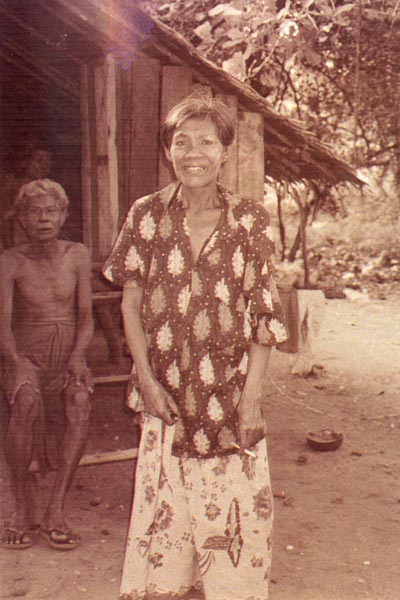 ss19 Jpeg 60K A Malay women. This village near Ranong, subsists on the proceeds of rubber.