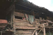 to Jpeg 23K Close-up of the elephant mahouts' lodgings near Mae Hong Son, northern Thailand 8812j26.jpg