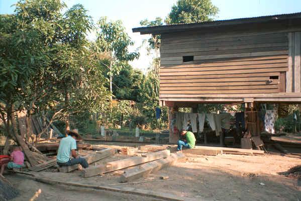 Working on building timber at a Sgaw Karen village along the Mae Kok river between Tha Thon and Chiang Rai in northern Thailand 8812o31.jpg