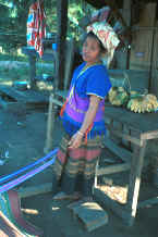 to Jpeg 33K Sgaw Karen woman standing by her backstrap loom dressed in a traditional hand-woven blouse 8812o37.jpg