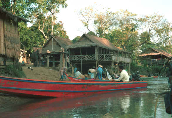 Boats at the shore of a Sgaw Karen village along the Mae Kok river between Tha Thon and Chiang Rai in northern Thailand 8812p04.jpg