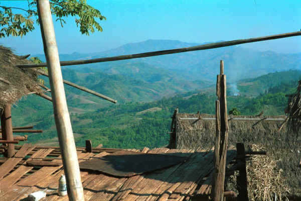 Looking down the valleys from the verandah of a U Lo-Akha house in a village in the hills around Chiang Rai 8812p21.jpg