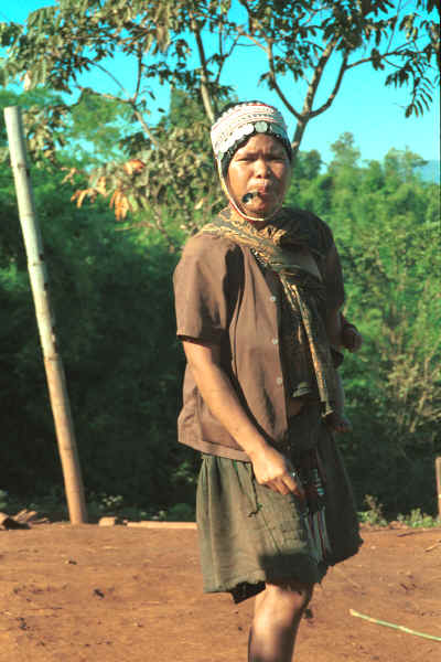 U Lo-Akha woman smoking a cheroot in a village in the hills around Chiang Rai 8812p23.jpg