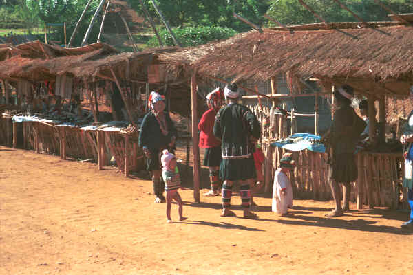 U Lo-Akha women and children by their stalls in a village in hills around Chiang Rai 8812p28.jpg