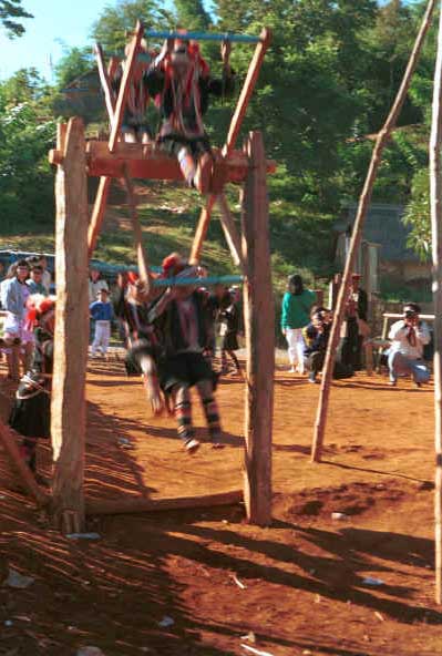 U Lo-Akha boys on the swing at the entrance to a village in the hills around Chiang Rai 8812p34E.jpg