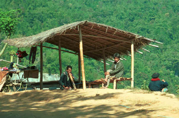 Yao man smoking a waterpipe in a village in the hills around Chiang Rai 8812q21.jpg