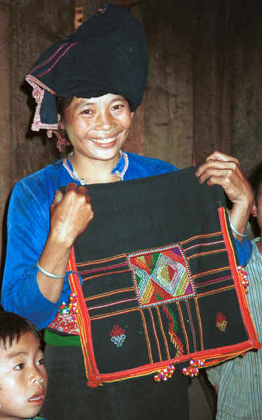 Jpeg K Black Thai woman with an embroidered head cloth.  See notes to photo to the left of this one in the Photo gallery.  Dien Bien Phu, Lai Chau Province. 9510D22.JPG