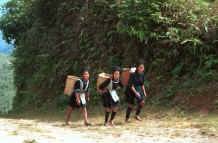 to 21K photo gallery.  Black Hmong girls climbing back to their village in the hills around Sa Pa, Lao Cai Province 9510K15.JPG