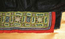 to Jpeg 40K Embroidered underside of a collar on a Black Hmong boy's sleeveless jacket.  This was purchased in Hanoi but similar to those from Black Hmong groups in the Sa Pa area, Lao Cai province 9511A29.JPG