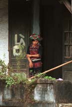 to 53K Jpeg 9510I12  Phula, Xa Pho girl in Sa Pa, Lao Cai Province, north west Vietnam. Note the wool embroidery and Jacob's tear seeds on the blouse.