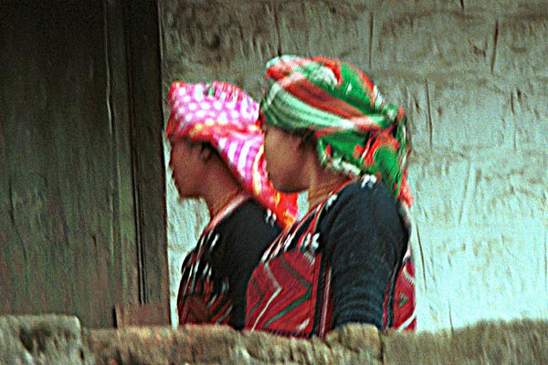 63K Jpeg 9510I13a Two Phula, Xa Pho girls in Sa Pa, Lao Cai Province, north west Vietnam. Note the wool embroidery and Jacob's tear seeds on the blouses. 