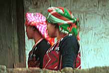 to 63K Jpeg 9510I13a Two Phula, Xa Pho girls in Sa Pa, Lao Cai Province, north west Vietnam. Note the wool embroidery and Jacob's tear seeds on the blouses. 