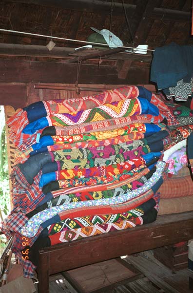 Pile of bedding in a Southern Thai house in Ban Lac village, Mai Chau District in Hoa Binh Province near the border with the north-western part of Thanh Hoa Province in north west Vietnam 9510A12E