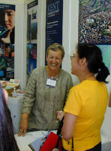 Pamela on the exhibition stand in Hong Kong promoting the University of Kent at Canterbury (UK) in August 2001